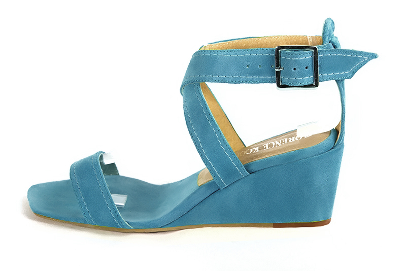 Peacock blue women's fully open sandals, with crossed straps. Square toe. Medium wedge heels. Profile view - Florence KOOIJMAN